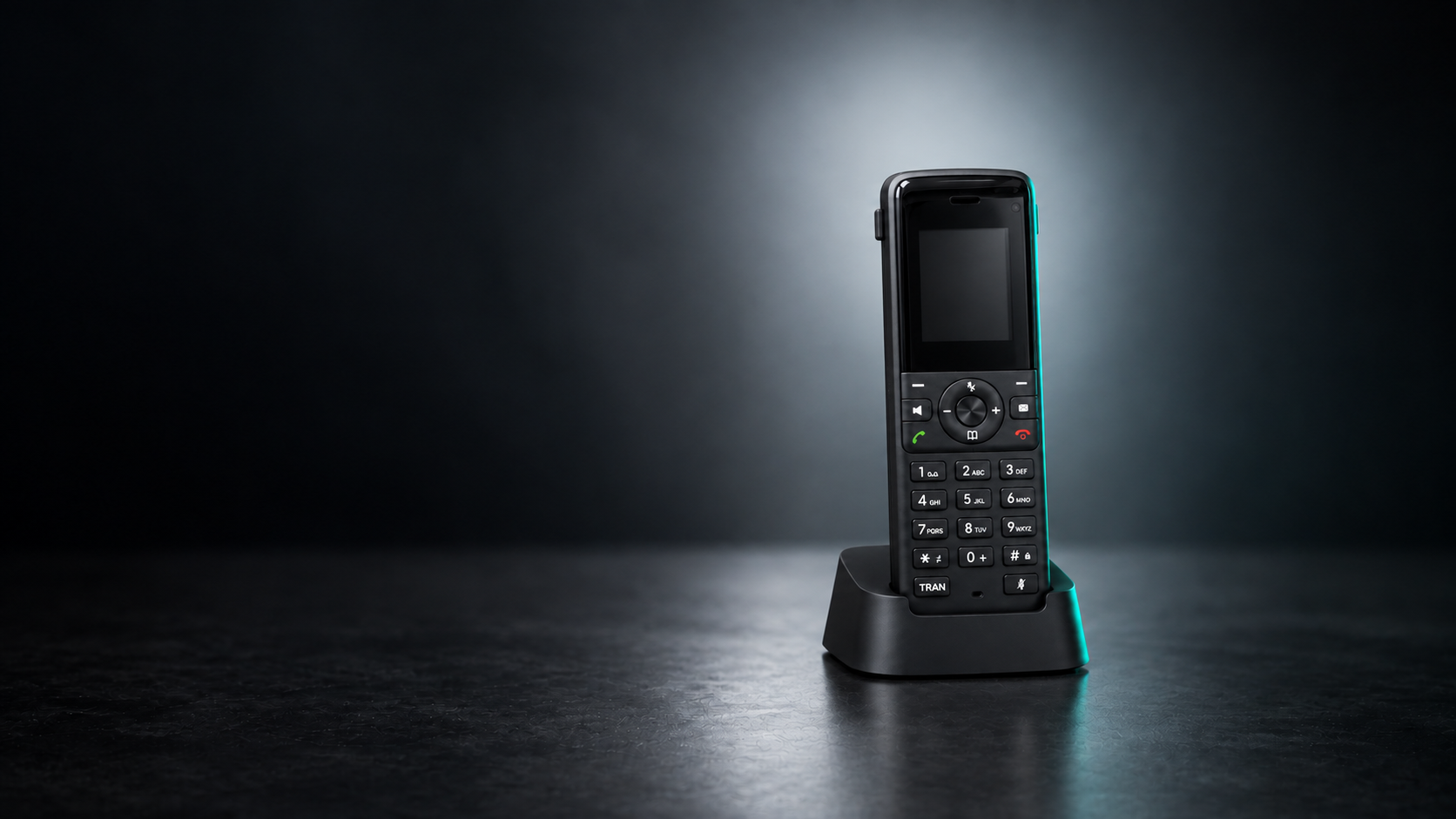 FullCap shop handset and charging base with subtle teal studio lighting